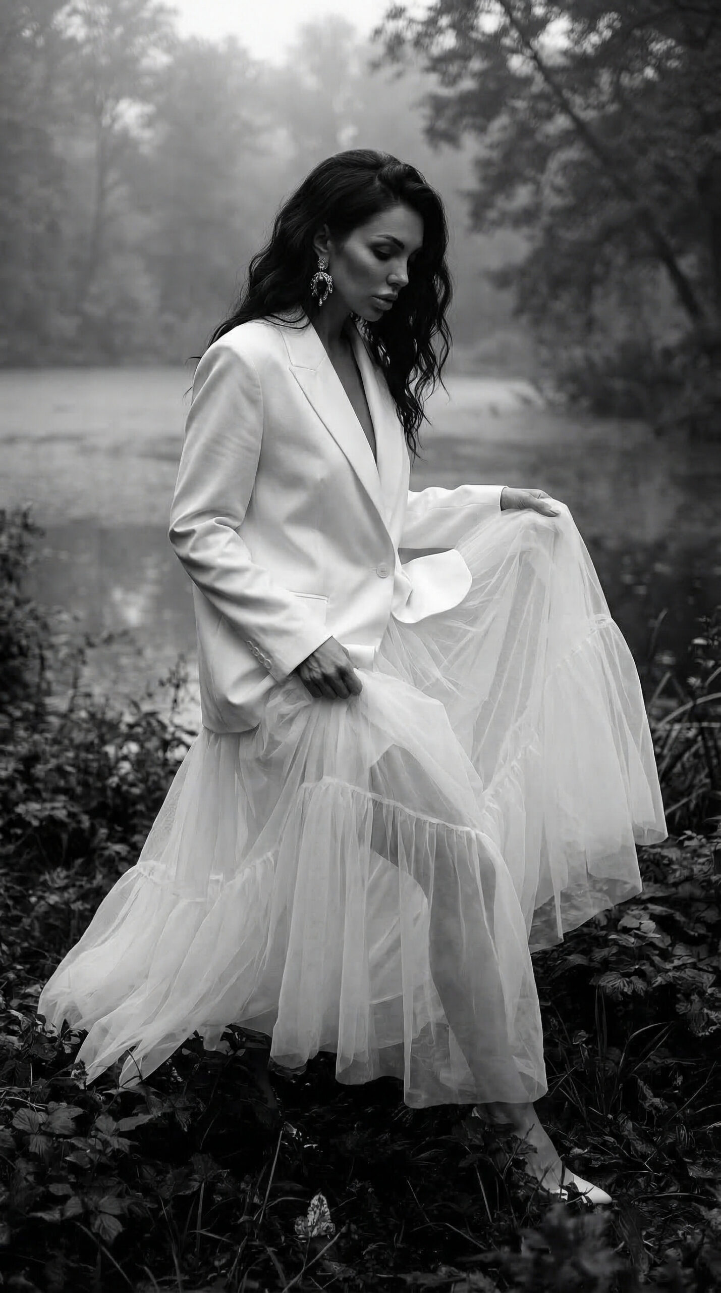 A cinematic couture fashion editorial set beside a mist-covered forest lake.