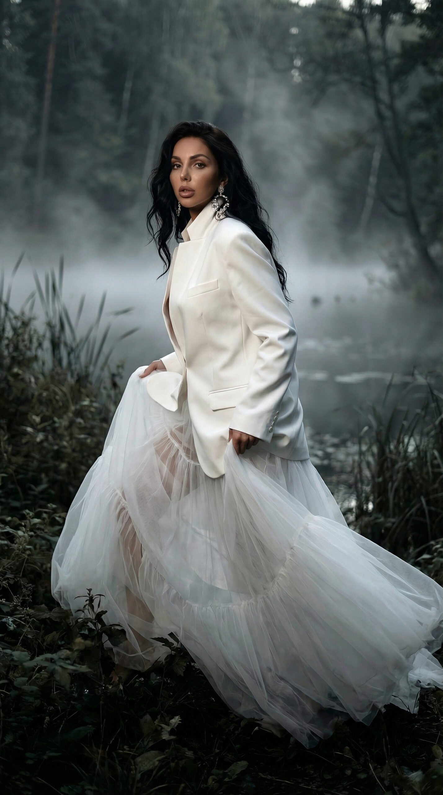 A cinematic couture fashion editorial set beside a mist-covered forest lake.